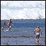 Swedish tourist Karin Svaerd runs towards her family and the incoming tsunami on a Thai beach